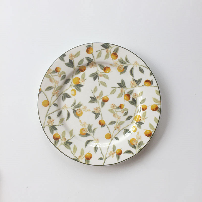 ceramic lemon & bird plate – round overglaze design
