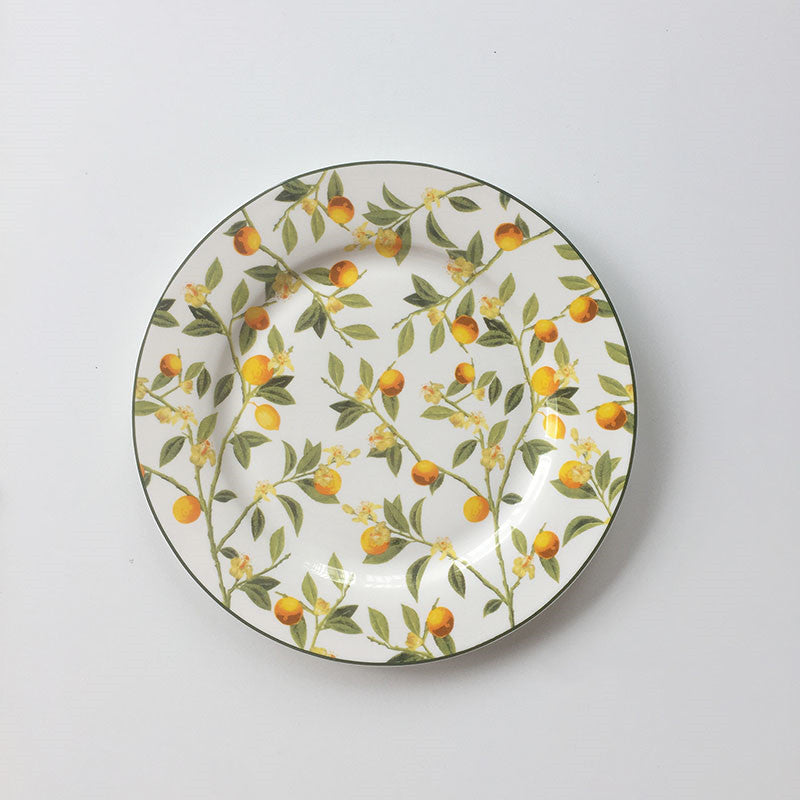 ceramic lemon & bird plate – round overglaze design